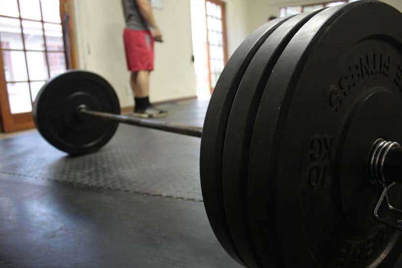 strength training barbell on floor