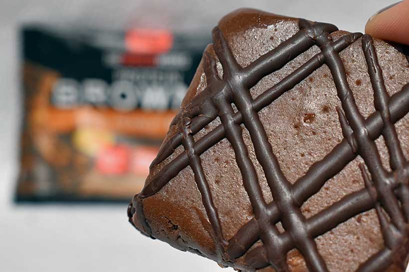 the protein works chocolate peanut protein brownie close up