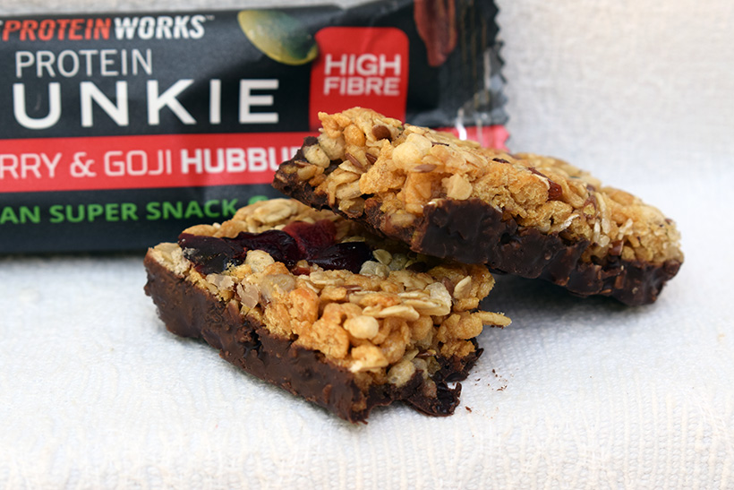 The protein works protein snacks Protein crunkie Cranberry and Goji Hubbub flavour packaging and energy bar