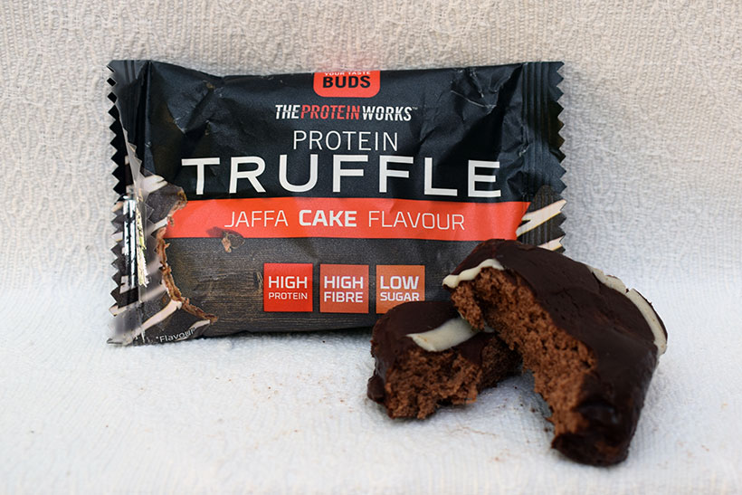 The protein works protein snacks Protein truffle Jaffa Cake Flavour Packaging and truffle