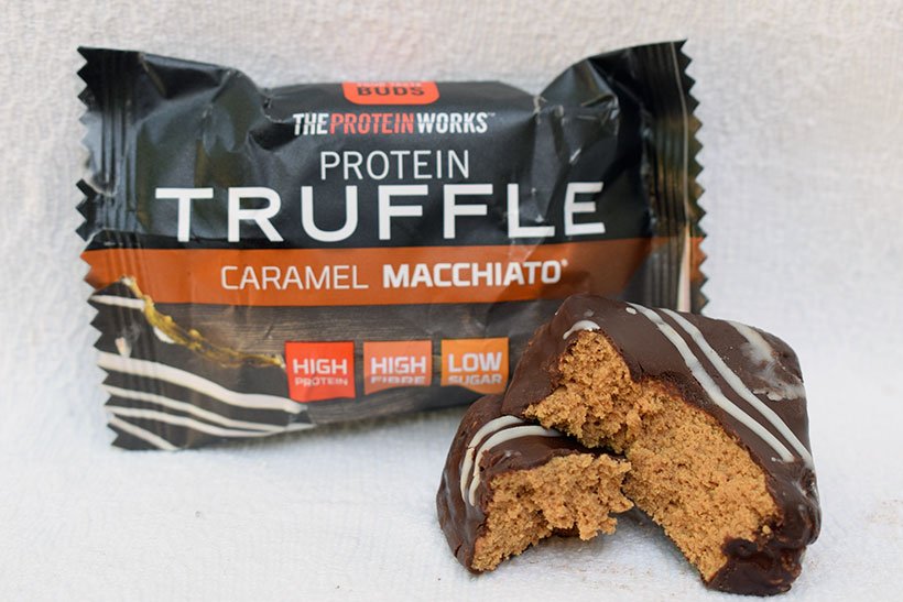 The protein works protein snacks Protein truffle caramel macchiato Flavour truffle inside