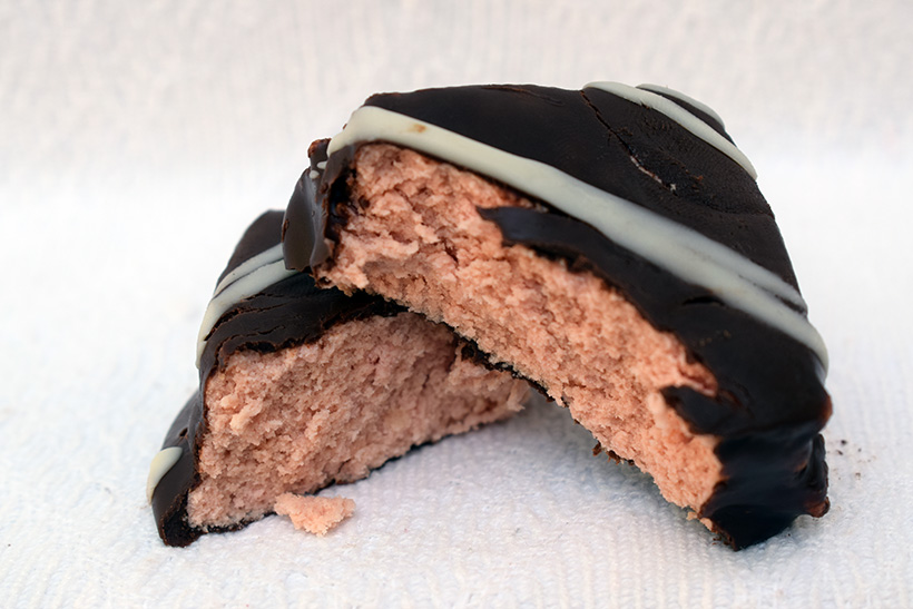 The protein works protein snacks Protein truffle strawberry cheesecake flavour inside close up